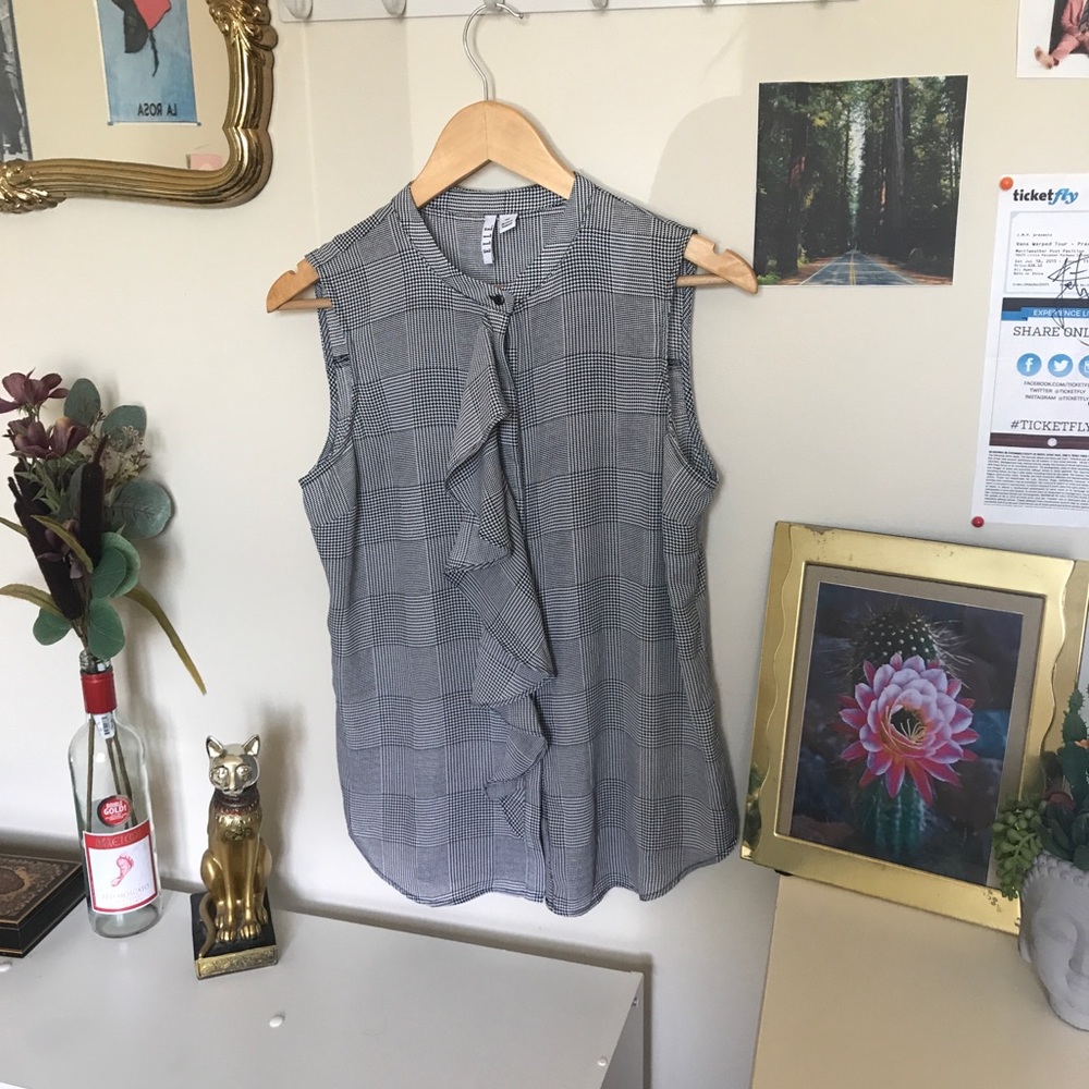 Ruffle button down tank top.